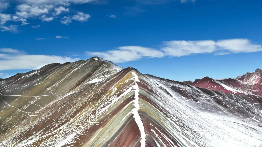 View of the colorful mountain with snow.